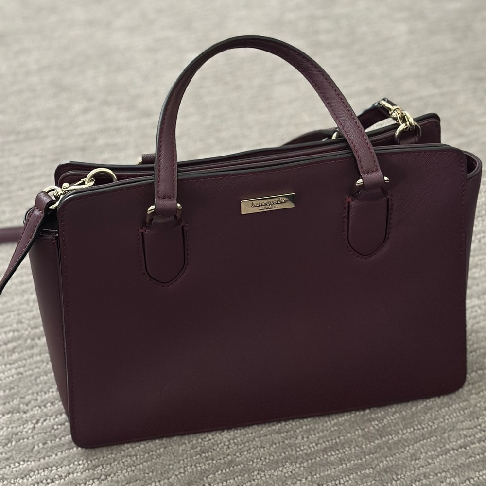 Kate Spade purse, purple, crossbody and carrying handles